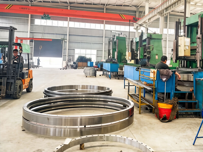 What causes abnormal noise and heavy rotation in slewing rings?